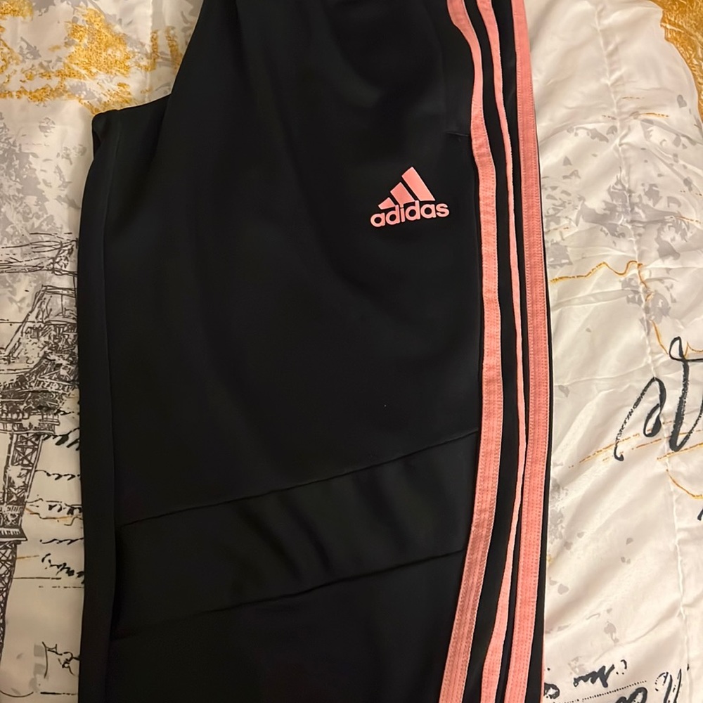Black and pink adidas pants